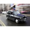 Photographic Print of London Cab Travelling Through Traffic